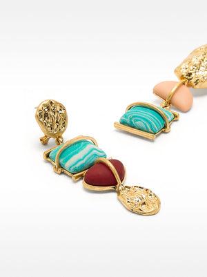 Pendientes maxi asimétricos