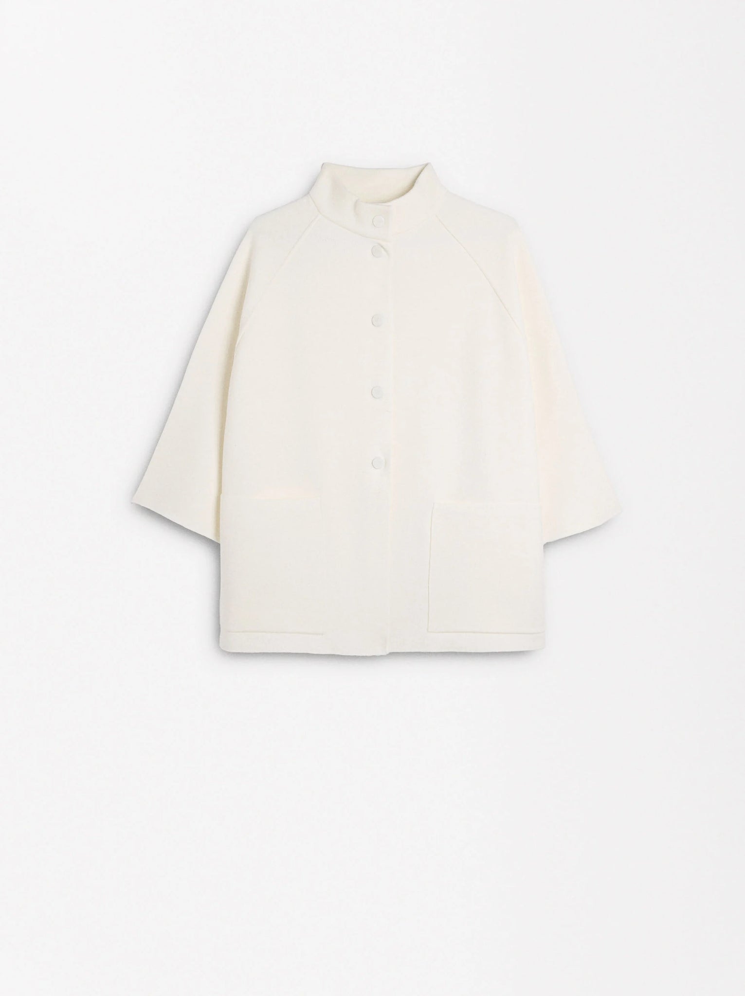 Poncho de punto con botones