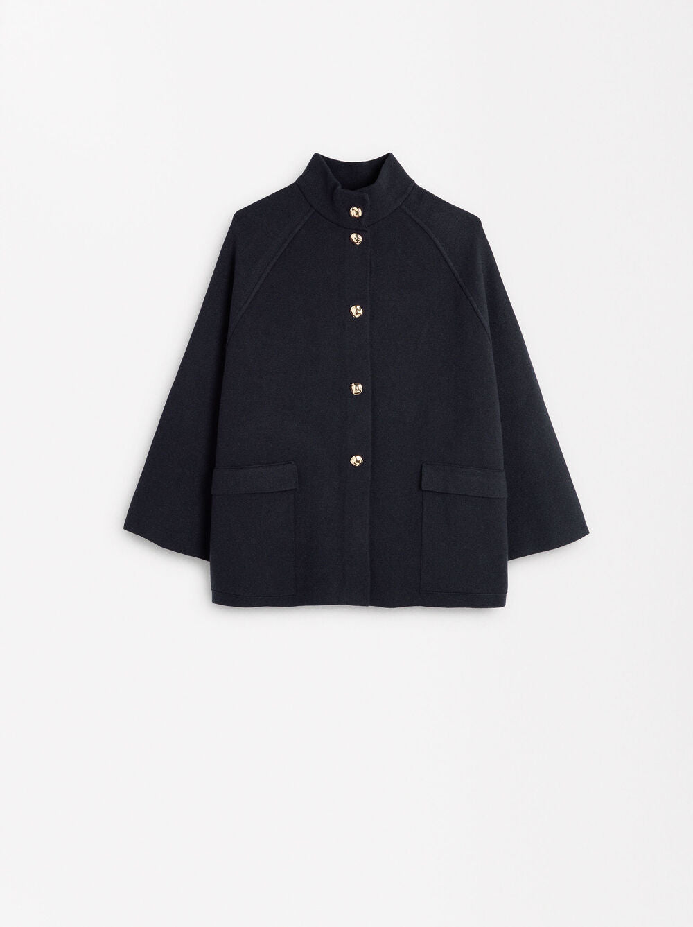 Poncho De Punto De Cuello Alto