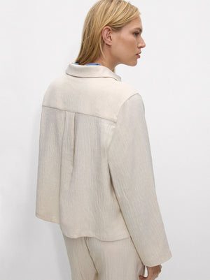 Camisa fluida con efecto arrugado