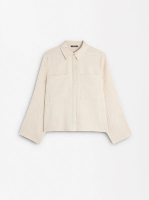 Camisa fluida con efecto arrugado
