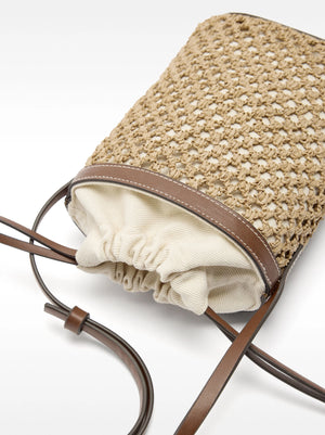 Bolso tipo bucket efecto rafia