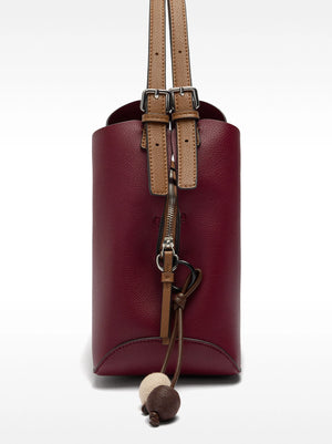 Bolso de mano con colgante