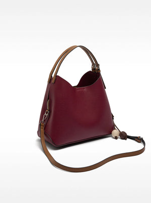 Bolso de mano con colgante