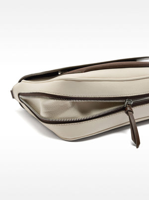 Bolso bandolera extensible con solapa