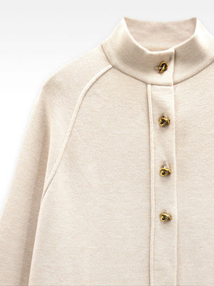Poncho de punto con cuello alto