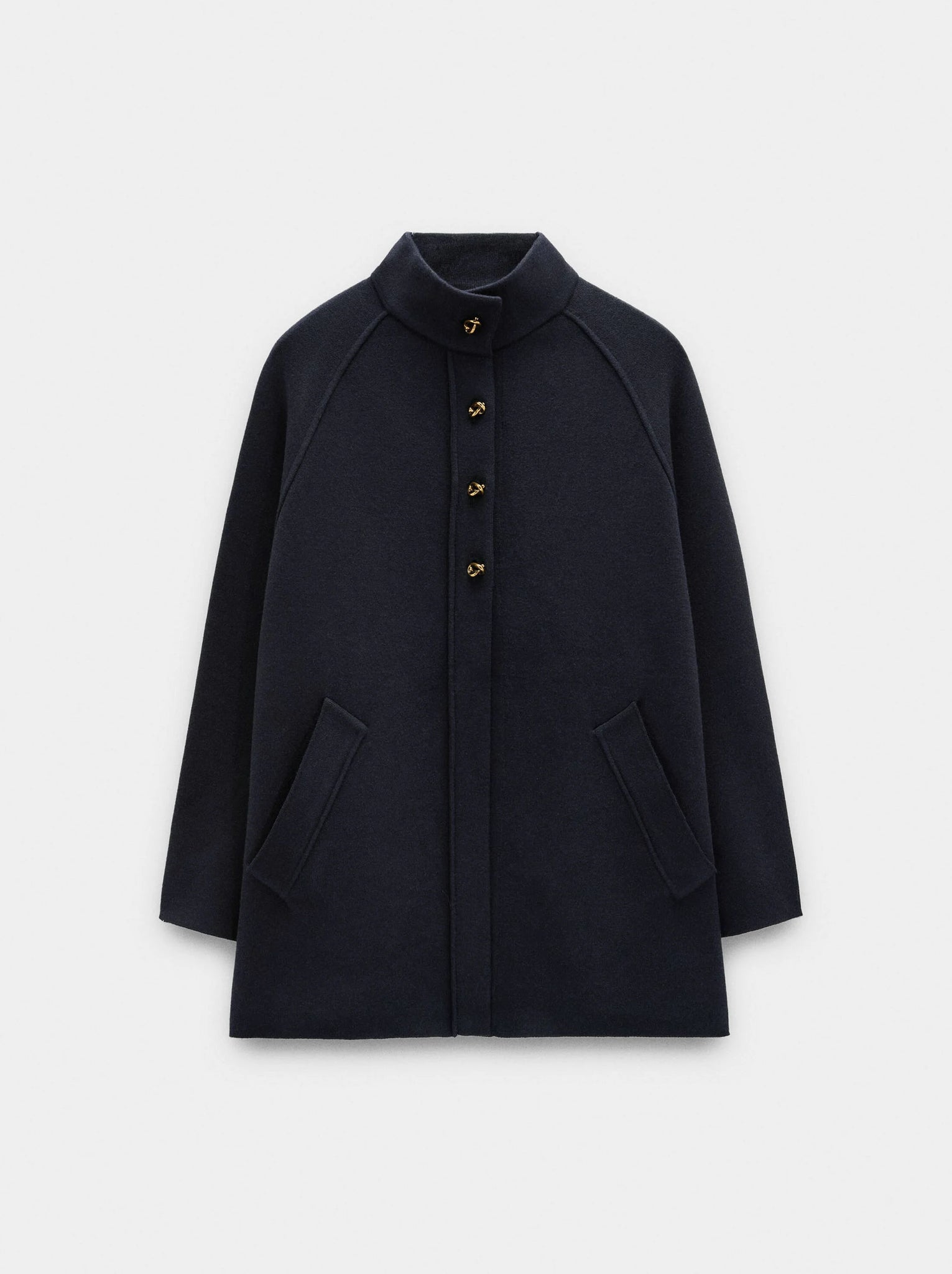 Poncho de punto con cuello alto