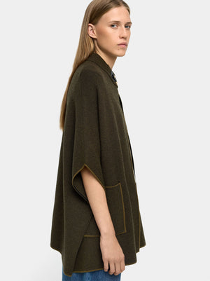 Poncho de punto con detalle de costura