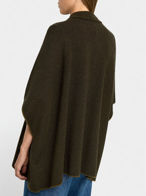 Poncho de punto con detalle de costura