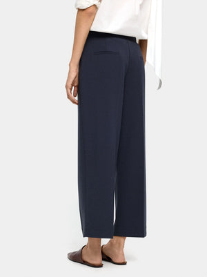 Pantalón fluido con bolsillos