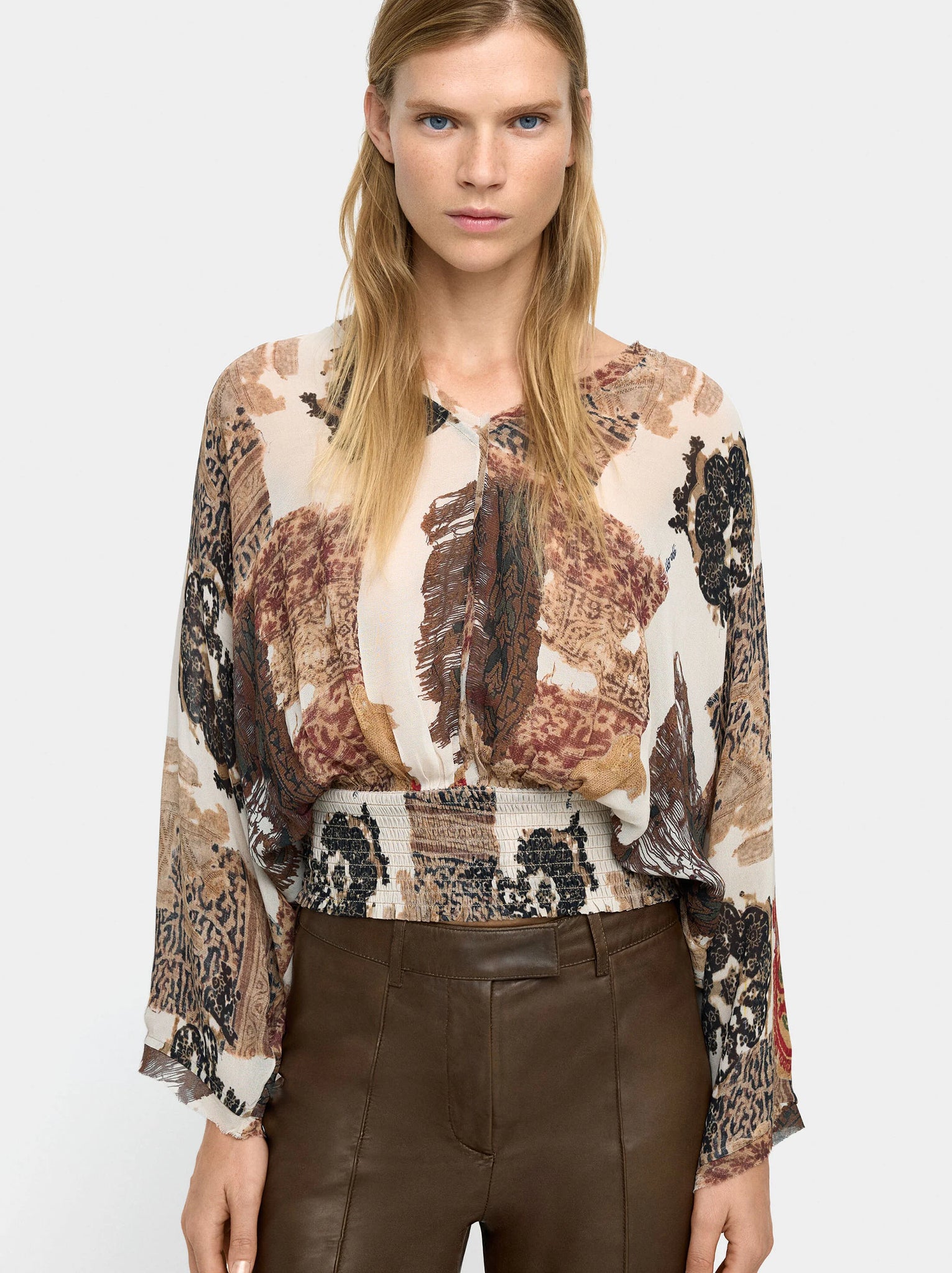 Blusa estampada semitransparente