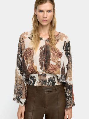 Blusa estampada semitransparente