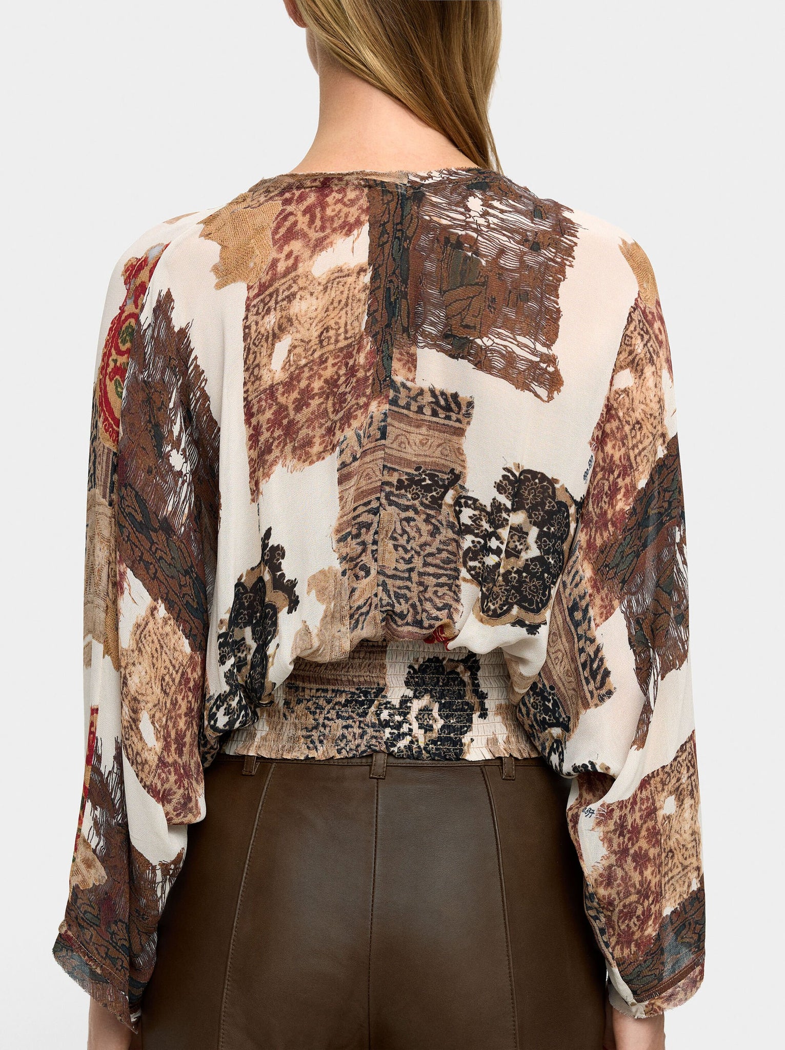 Blusa estampada semitransparente