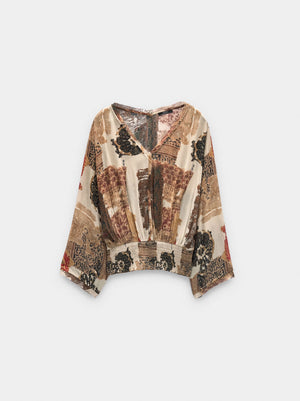 Blusa estampada semitransparente