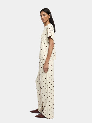 Pantalón de lunares con cintura elástica