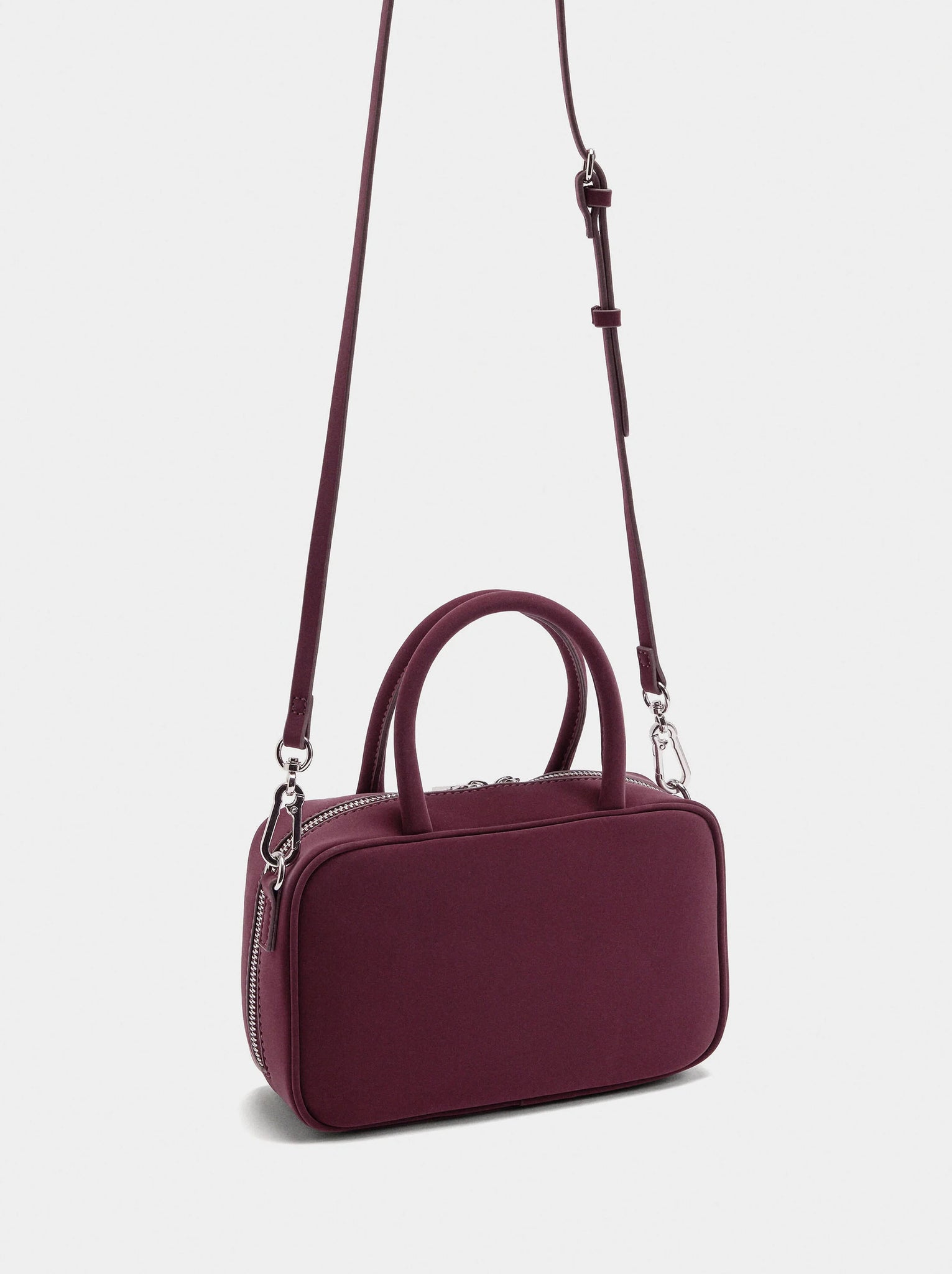 Bolso bowling de textura suave