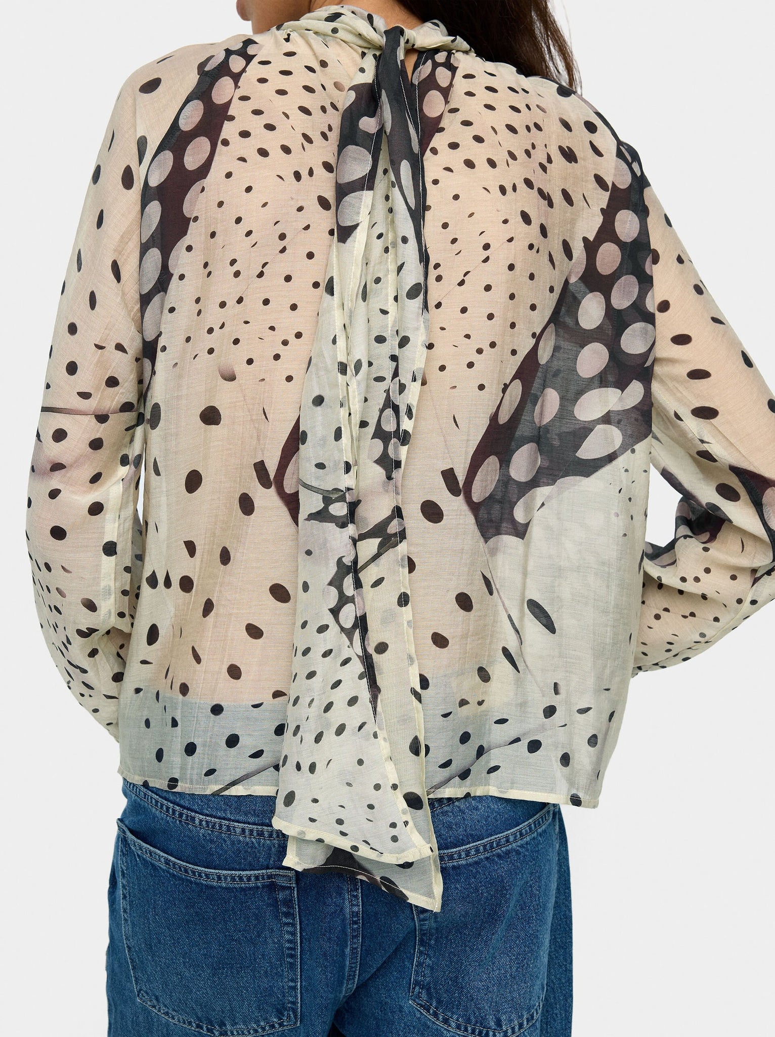 Blusa estampada semitransparente