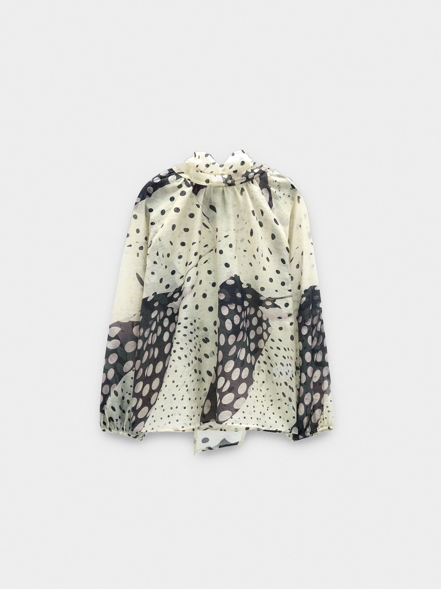 Blusa estampada semitransparente